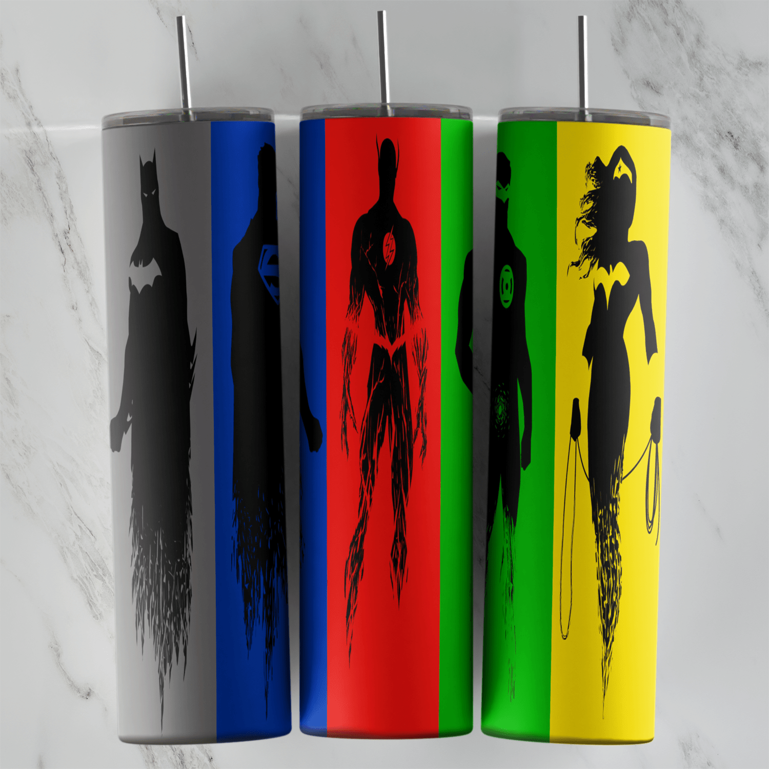 A 20 oz skinny tumbler wrap with black hero silhouettes of Batman, Superman, the Flash, Green Lantern and Wonder Woman on bright. Sublimation design