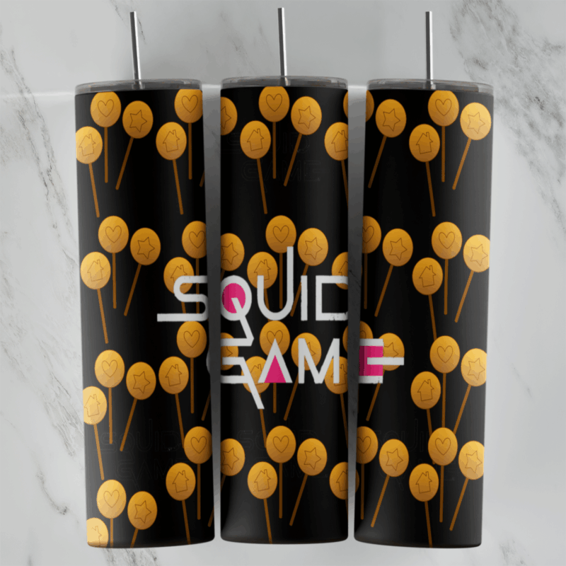 A Squid Game tumbler wrap on black covered with round yellow dalgona candies on sticks, with the white Squid Game logo. Sublimation design