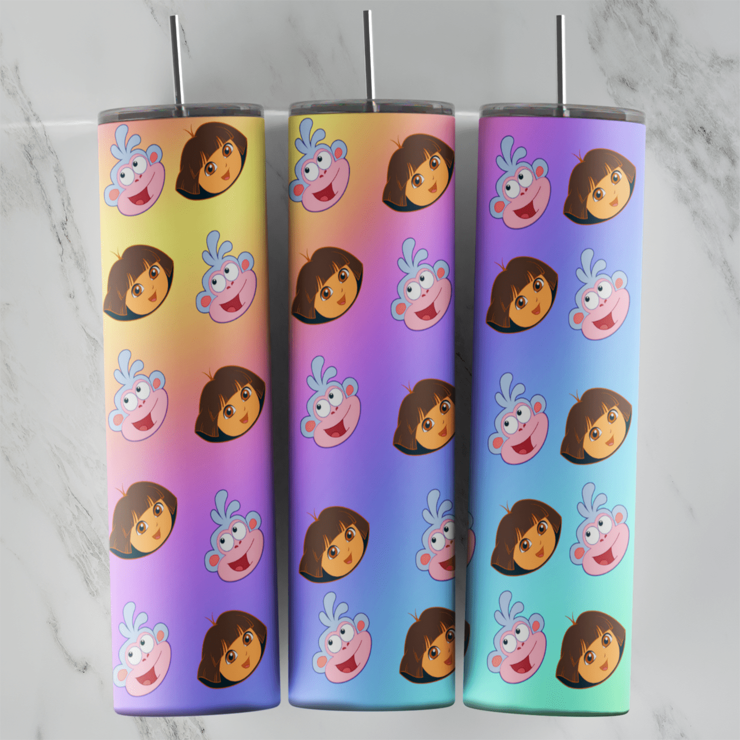 A pastel rainbow 20 oz tumbler wrap covered in a repeating pattern of Dora’s face and Boots the monkey’s face. Sublimation design