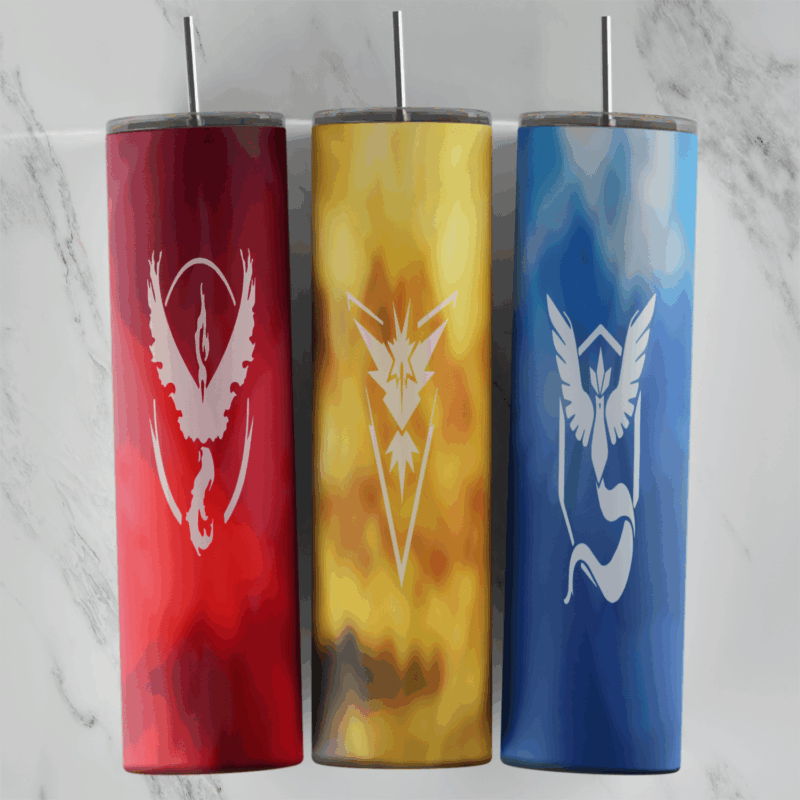 A 20 oz skinny tumbler wrap with the three Pokemon Go team emblems, Valor, Instinct and Mystic, in white on red, yellow and blue. Sublimation design