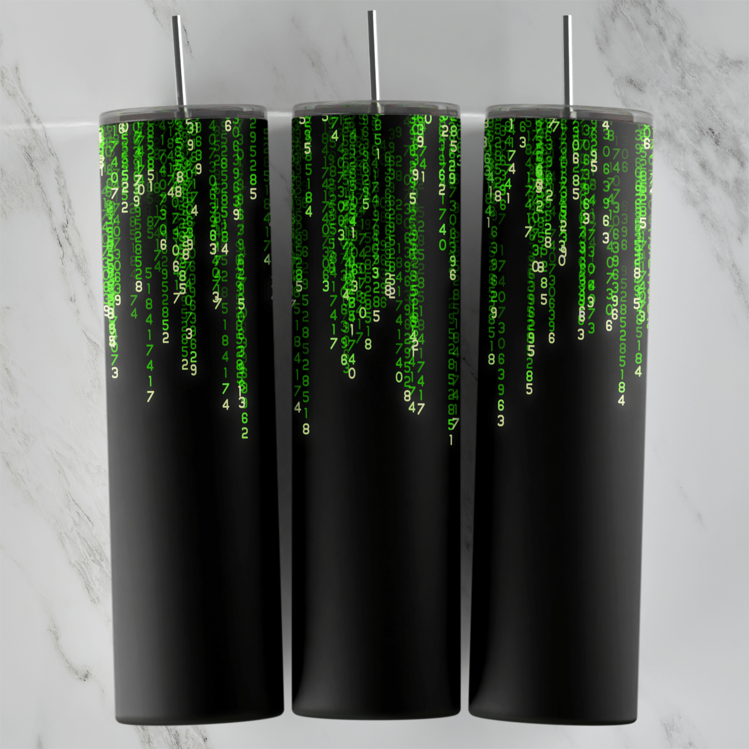 A full 20 oz skinny tumbler wrap in solid black with streams of green Matrix code characters dripping down from the top edge. Sublimation design