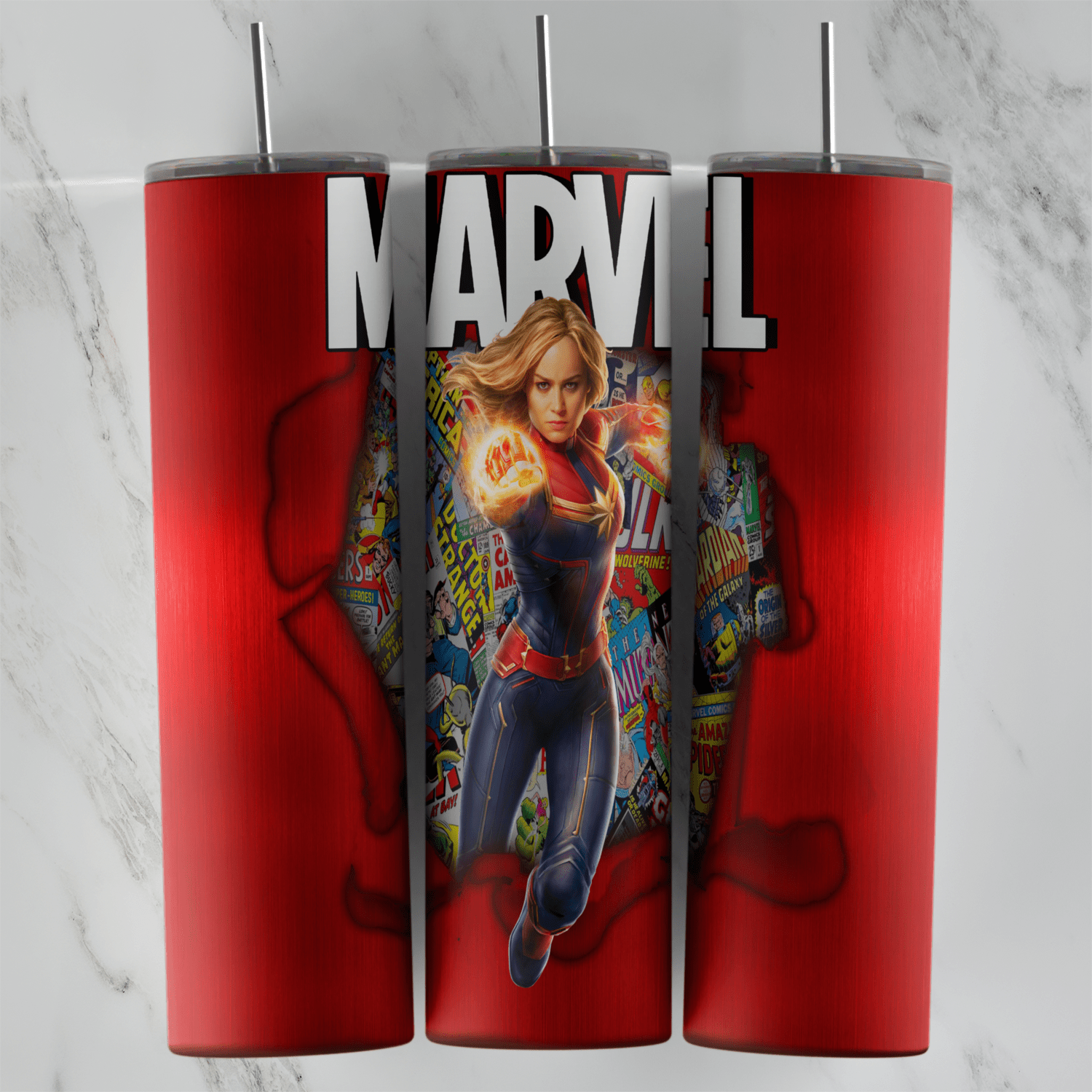 A 20 oz skinny tumbler wrap in glossy red with the big MARVEL logo on top and Captain Marvel with glowing fists breaking out. Sublimation design
