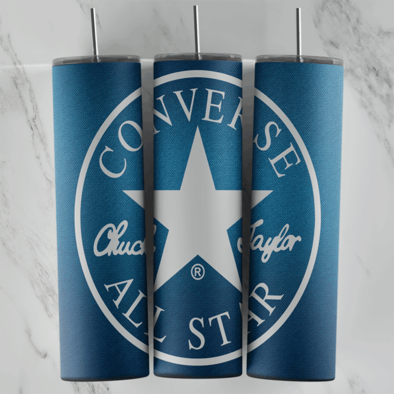 A full 20 oz skinny tumbler wrap in blue with a large round Converse Chuck Taylor All Star logo and a white star in the center. Sublimation design