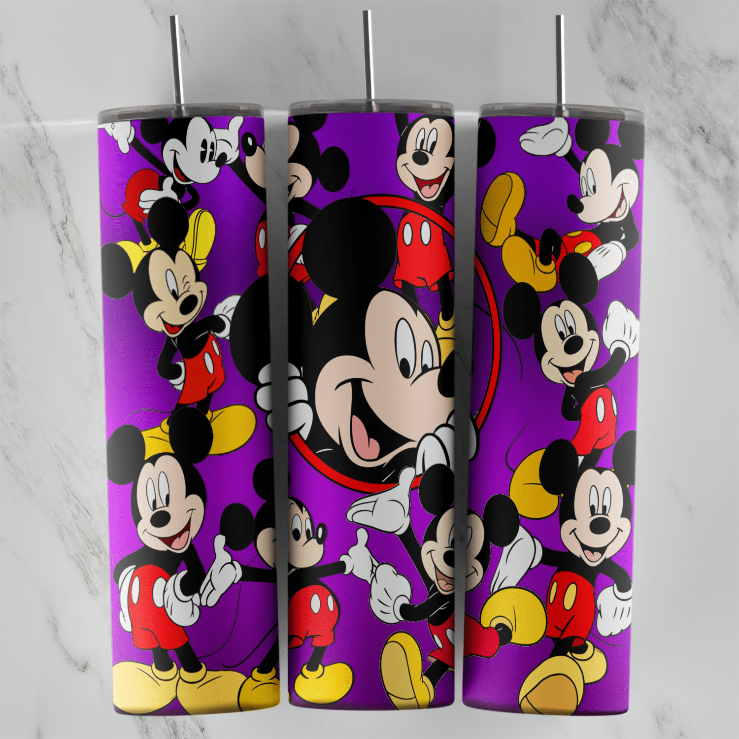 A 20 oz skinny tumbler wrap covered in a collage of Mickey Mouse poses on a purple background, with a large smiling Mickey inside. Sublimation design