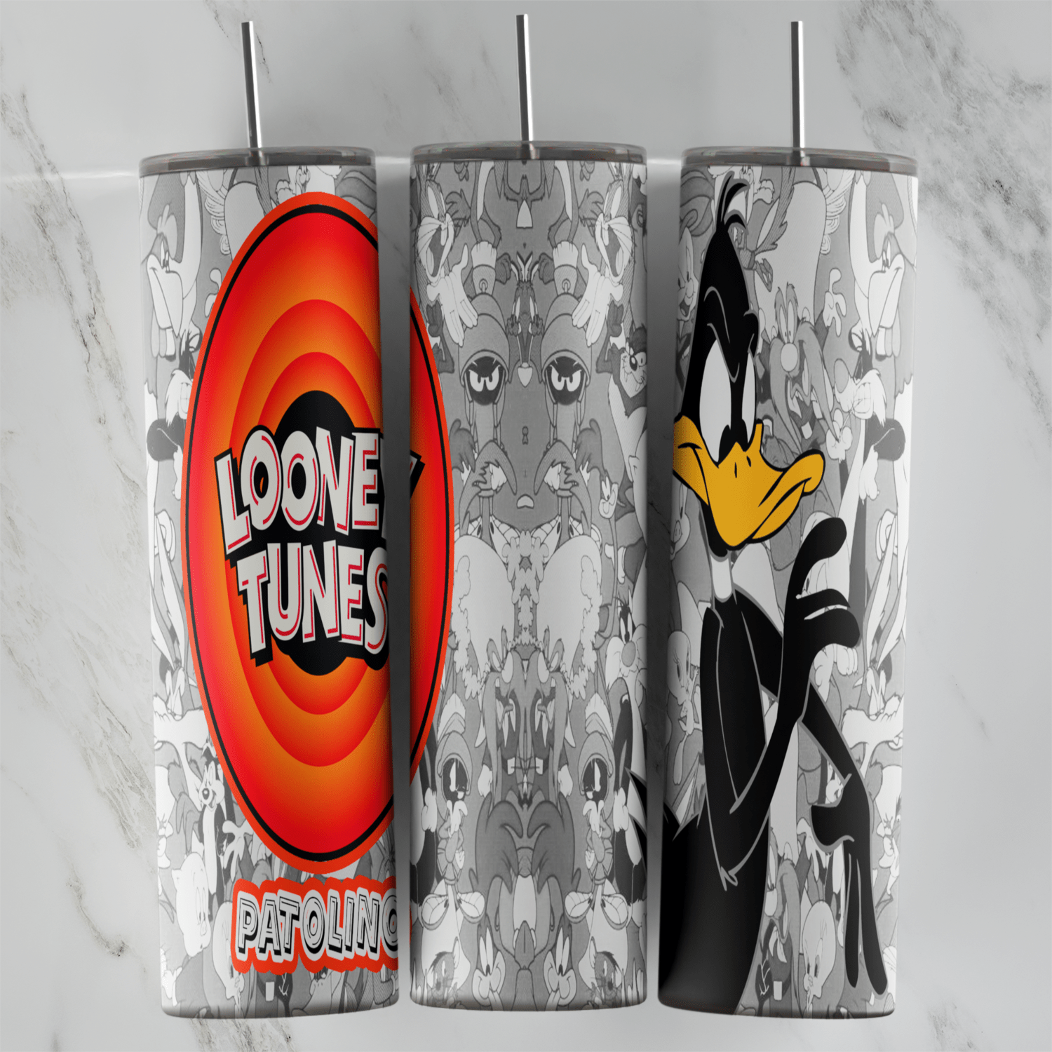 A 20 oz skinny tumbler wrap in gray and white with Daffy Duck, the orange Looney Tunes logo, a faded character pattern. Sublimation design