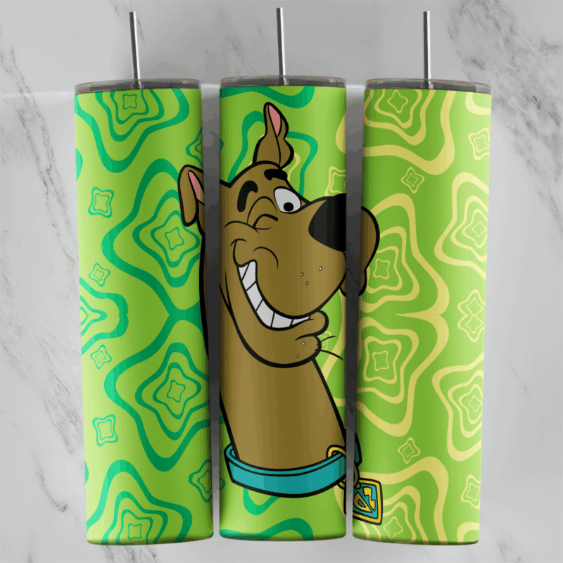 A 20 oz skinny tumbler wrap with a grinning Scooby-Doo face and blue collar over a groovy green and yellow wavy pattern. Sublimation design