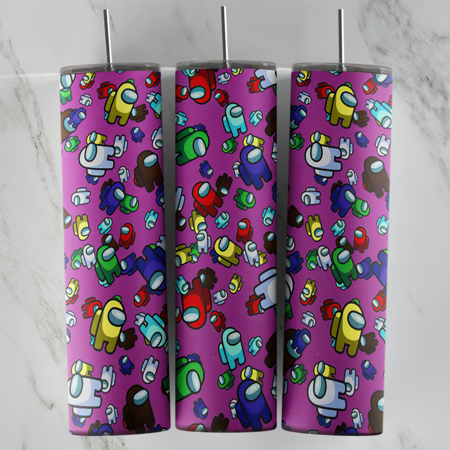 A 20 oz skinny tumbler wrap with a pattern of small colorful Among Us crewmates, some wearing hats, scattered on a pink. Sublimation design