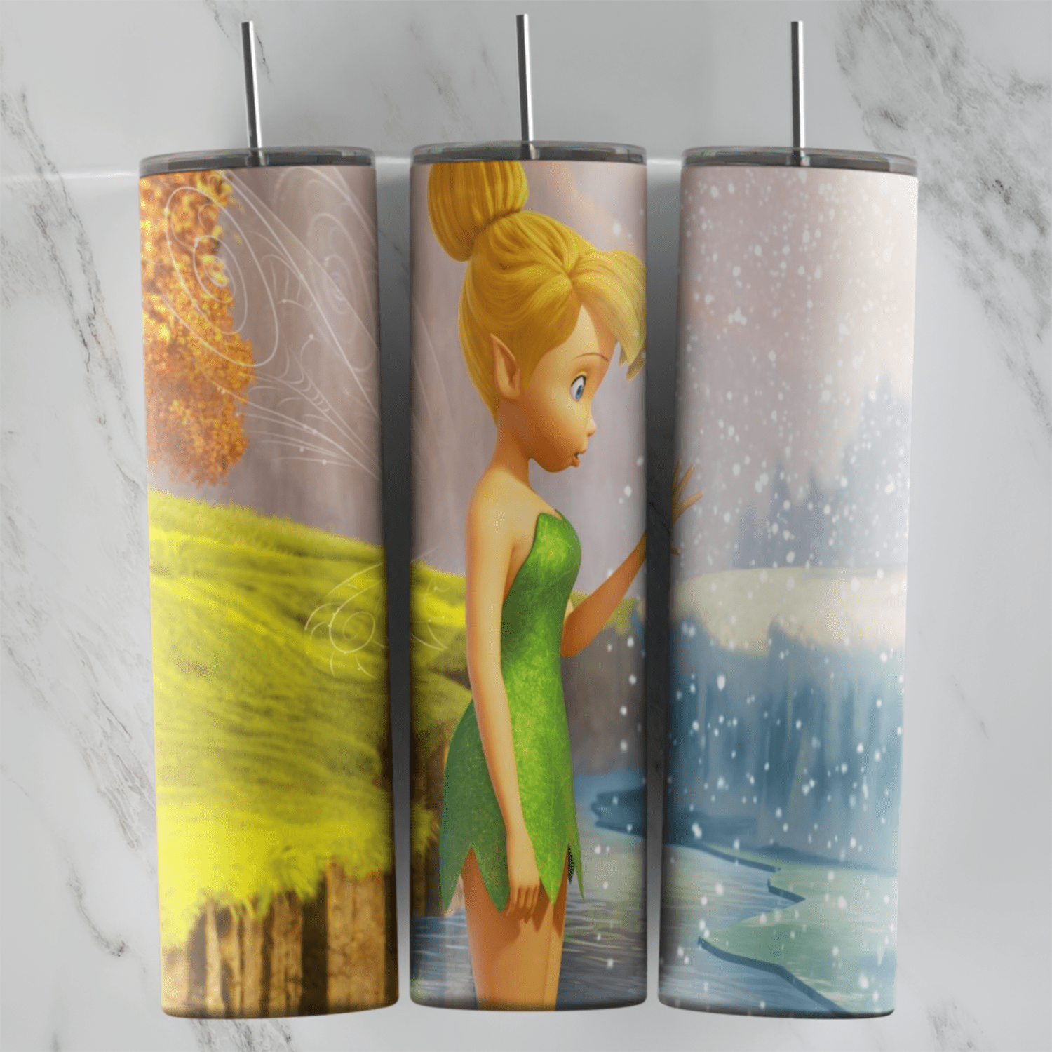A Tinker Bell tumbler wrap with Tink in her green leaf dress standing in the middle of a landscape of autumn leaves, a yellow. Sublimation design