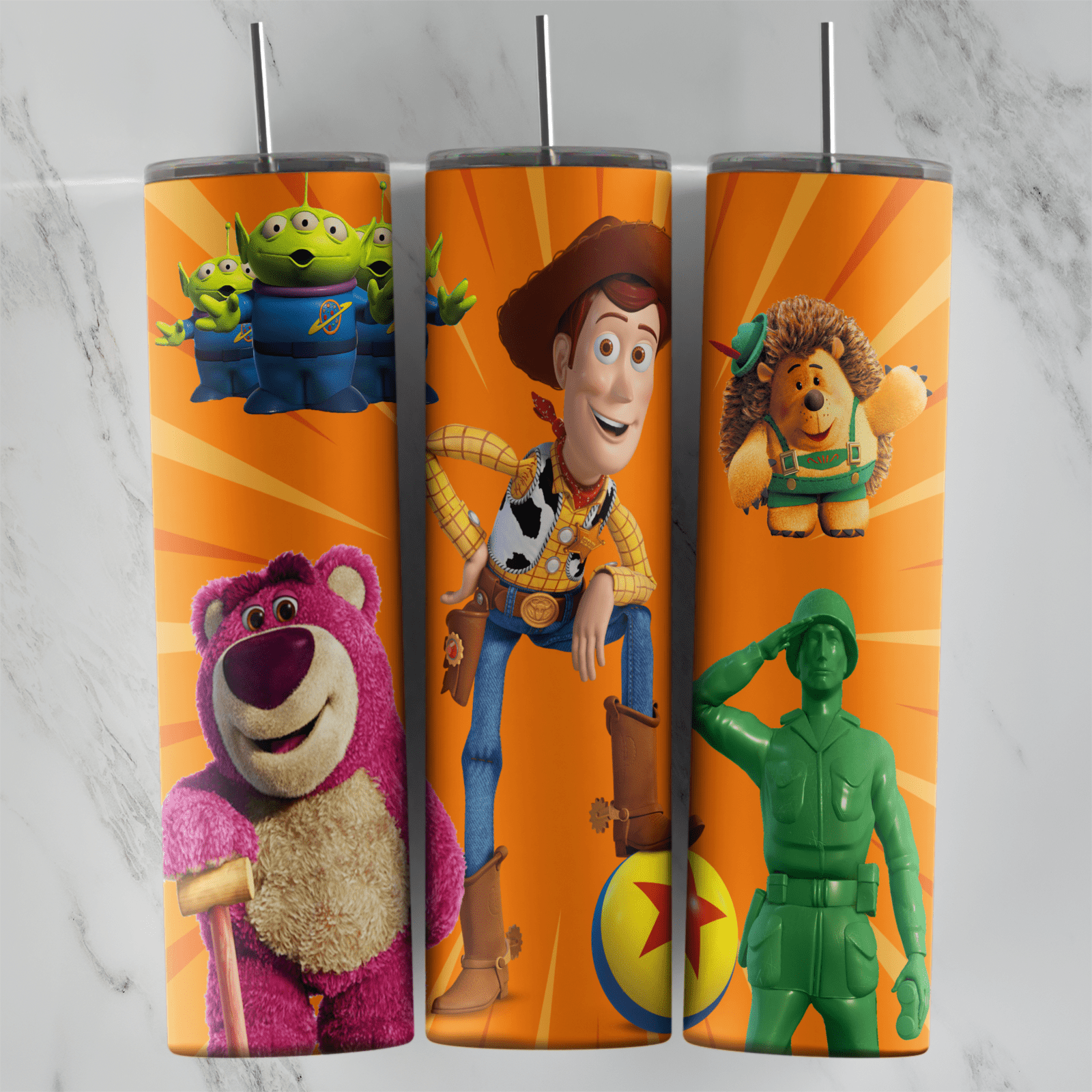 A 20 oz skinny tumbler wrap on an orange sunburst featuring Woody with Lotso, the three-eyed aliens, Mr. Pricklepants, a green. Sublimation design