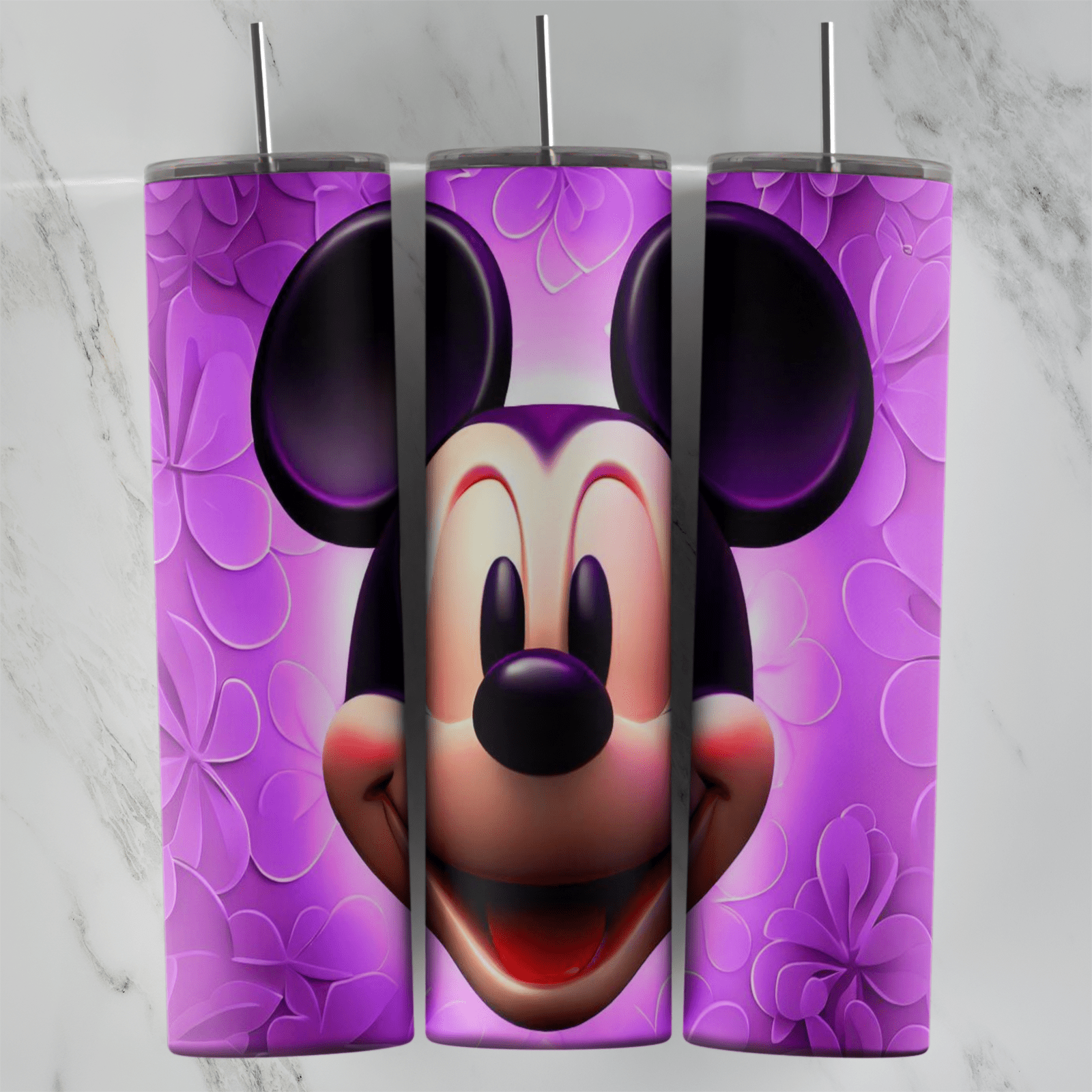 A 20 oz skinny tumbler wrap with a large 3D style Mickey Mouse face on a purple embossed flower background. Sublimation design