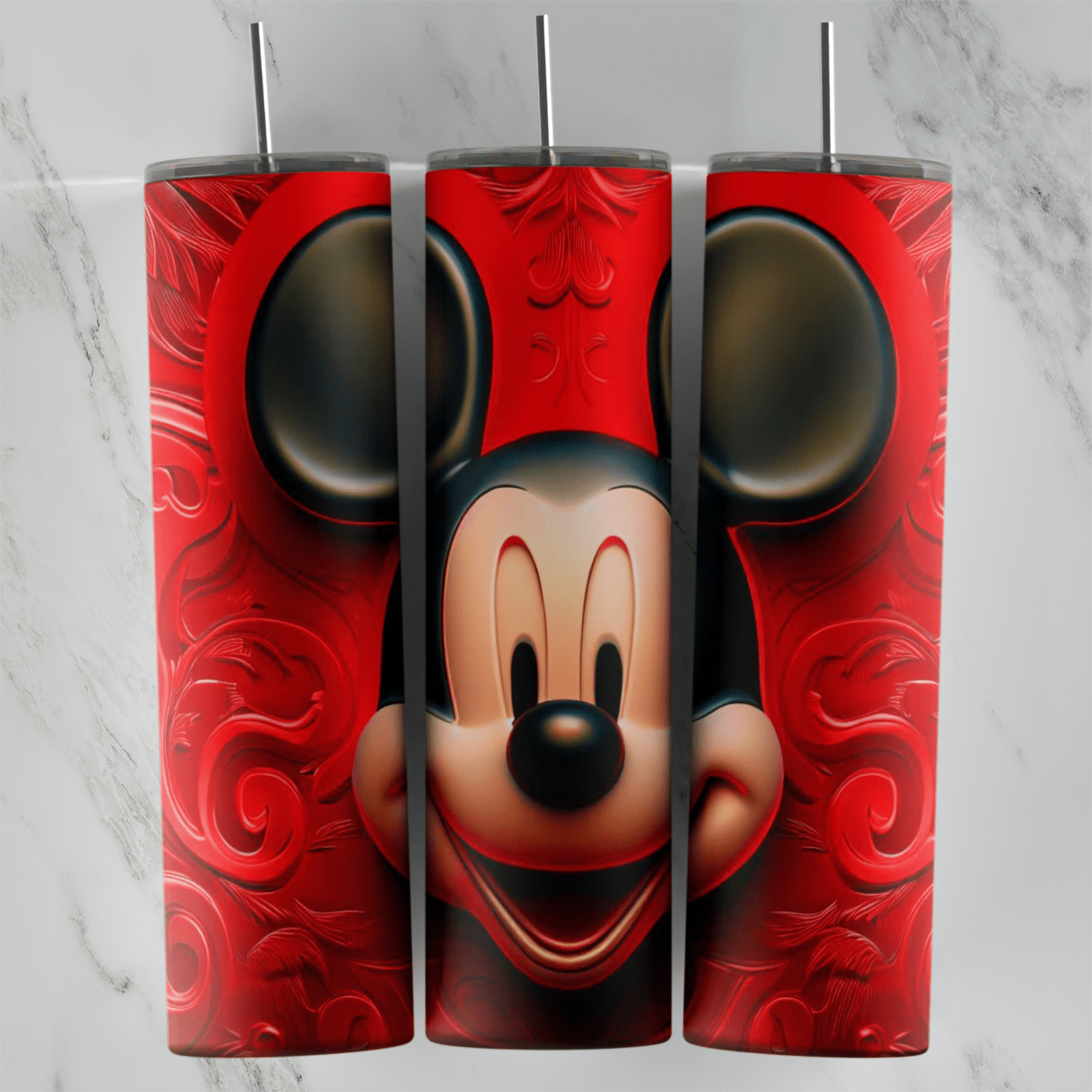 A 20 oz skinny tumbler wrap with a 3D Mickey Mouse face on a deep red background of embossed swirl patterns. Sublimation design