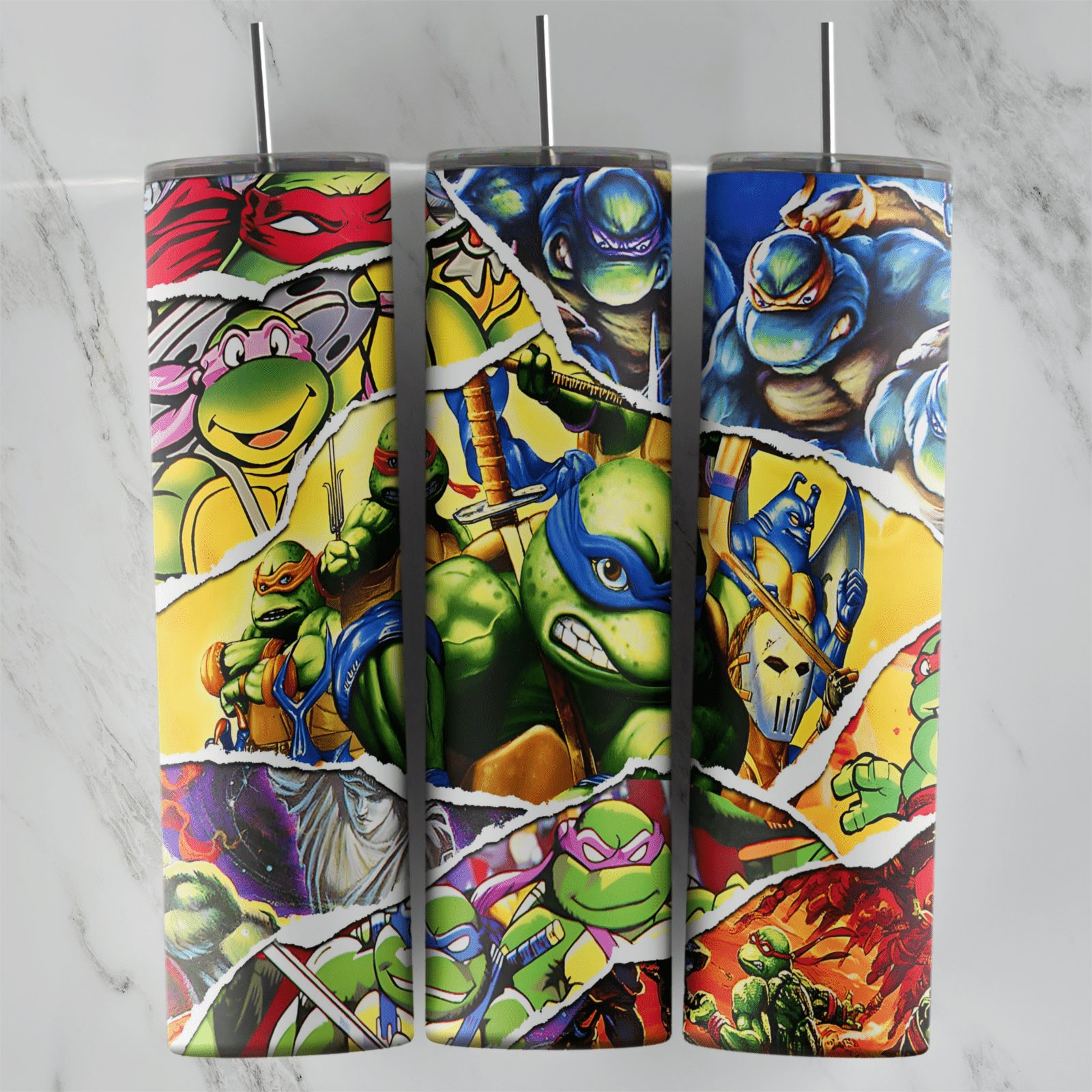 A 20 oz skinny tumbler wrap with a torn paper collage of ninja turtle comic panels in red, yellow and blue, with the turtles. Sublimation design