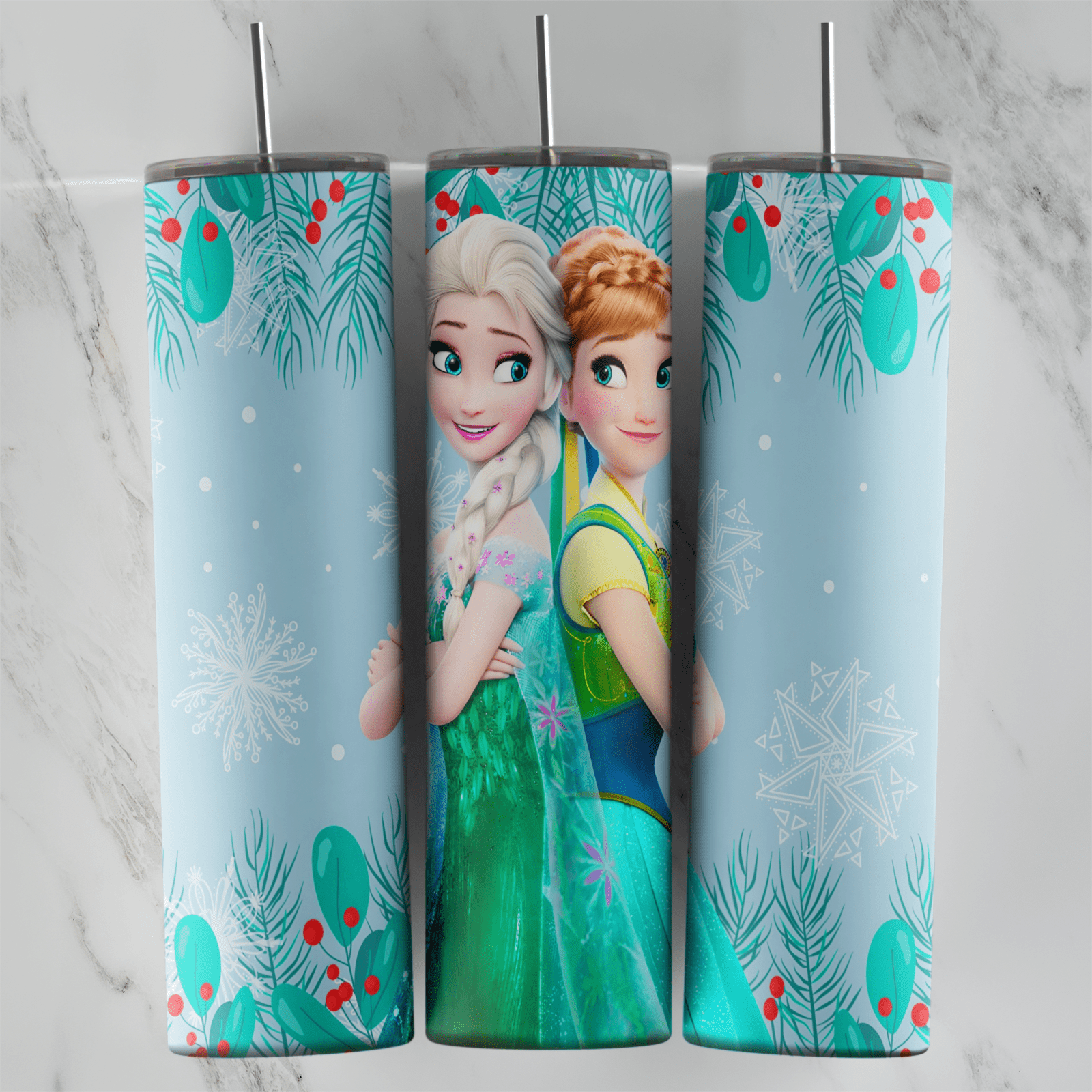 A 20 oz skinny tumbler wrap in pale aqua with Elsa and Anna in green summer dresses, framed by teal leaves, red berries. Sublimation design