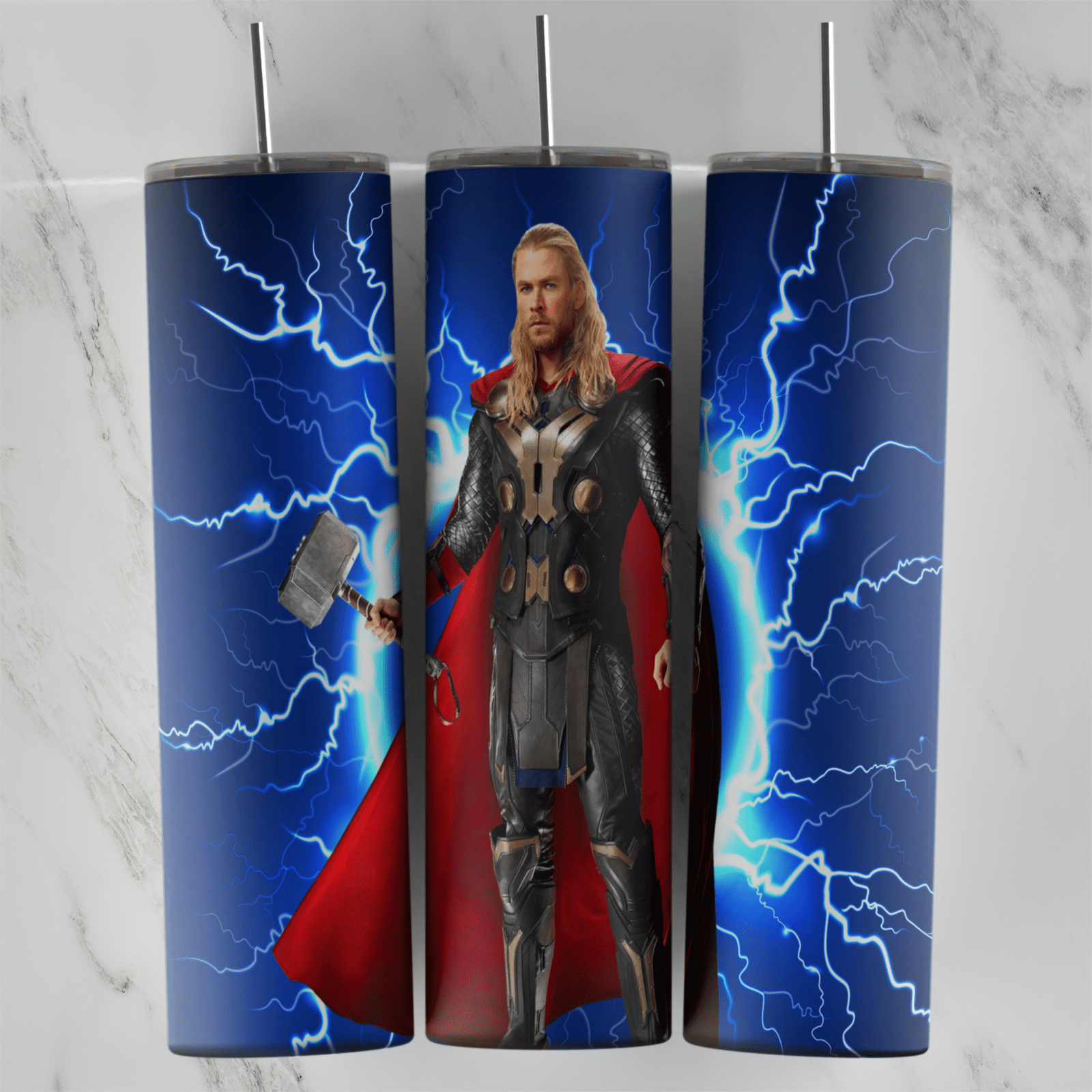 A full 20 oz skinny tumbler wrap with Thor in armor and red cape holding his hammer, surrounded by blue lightning on a blue. Sublimation design