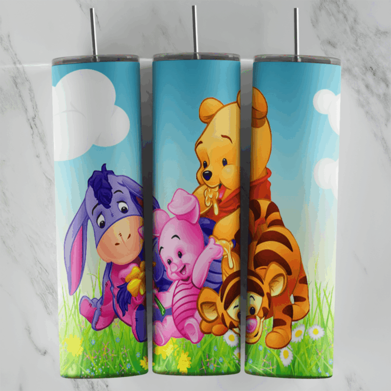 A 20 oz skinny tumbler wrap with baby Eeyore, Piglet, Pooh and Tigger sitting in green grass with daisies under a blue sky. Sublimation design