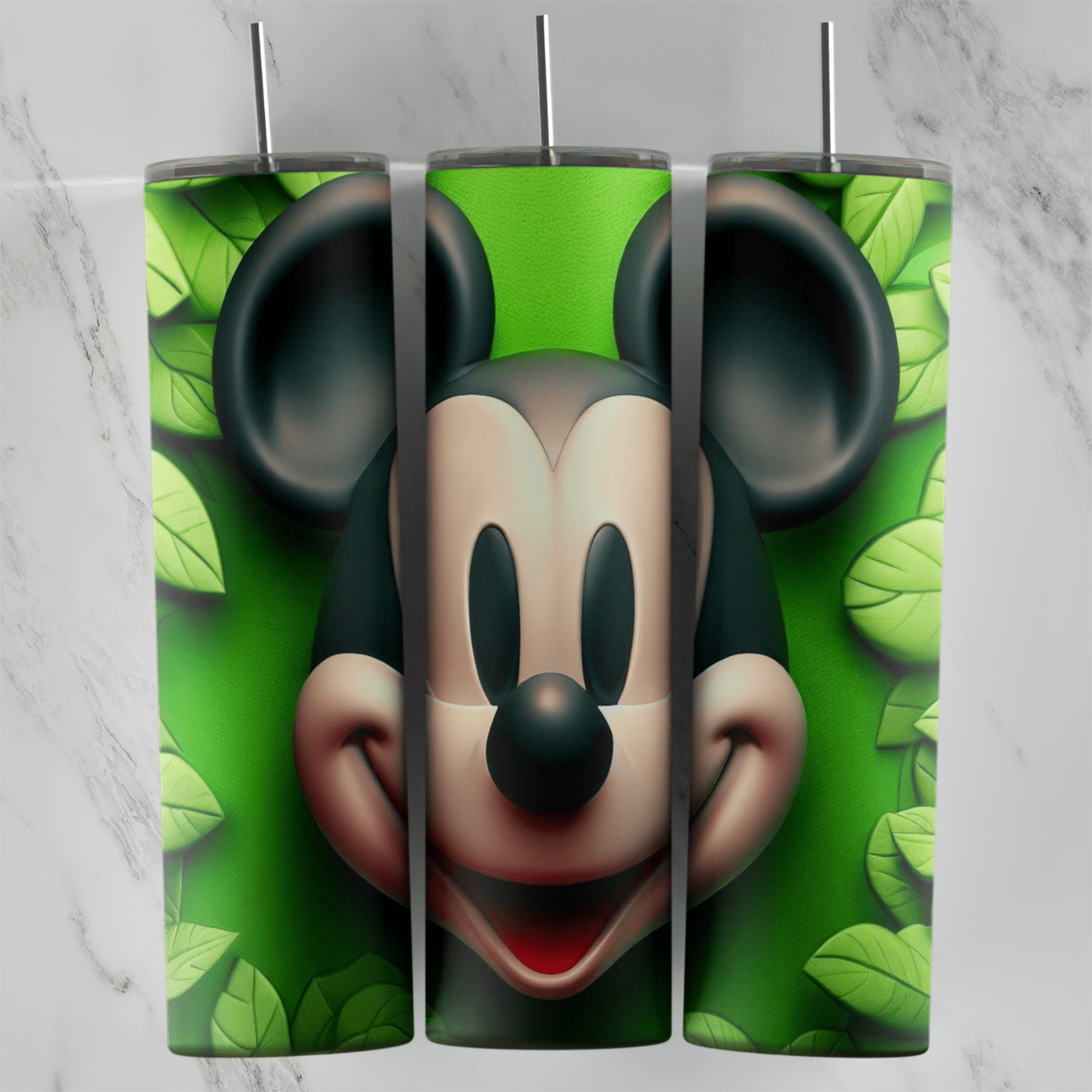 A 20 oz skinny tumbler wrap with a smiling 3D Mickey Mouse face surrounded by green 3D leaves. Sublimation design