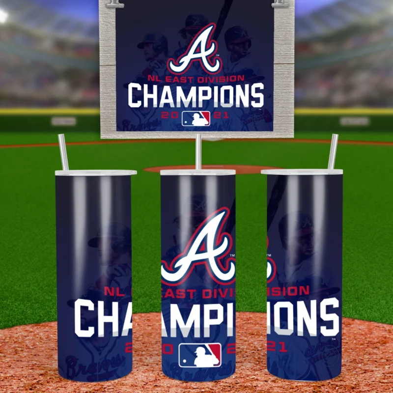 A 20 oz skinny tumbler wrap with the white Braves A logo, NL East Division Champions lettering and the MLB logo on a plain navy. Sublimation design